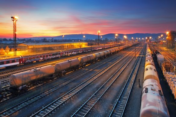 Cargo freigt train railroad station at dusk