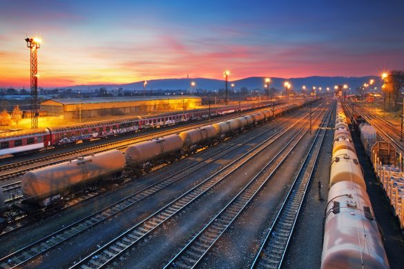 Cargo freigt train railroad station at dusk